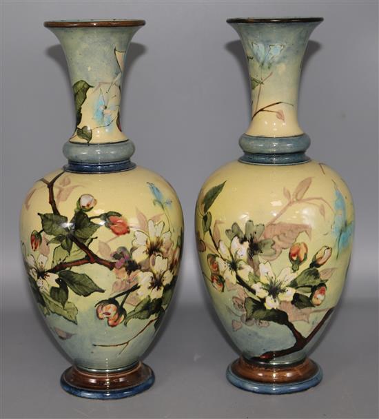 A pair of Doulton faience vases (A.F.)